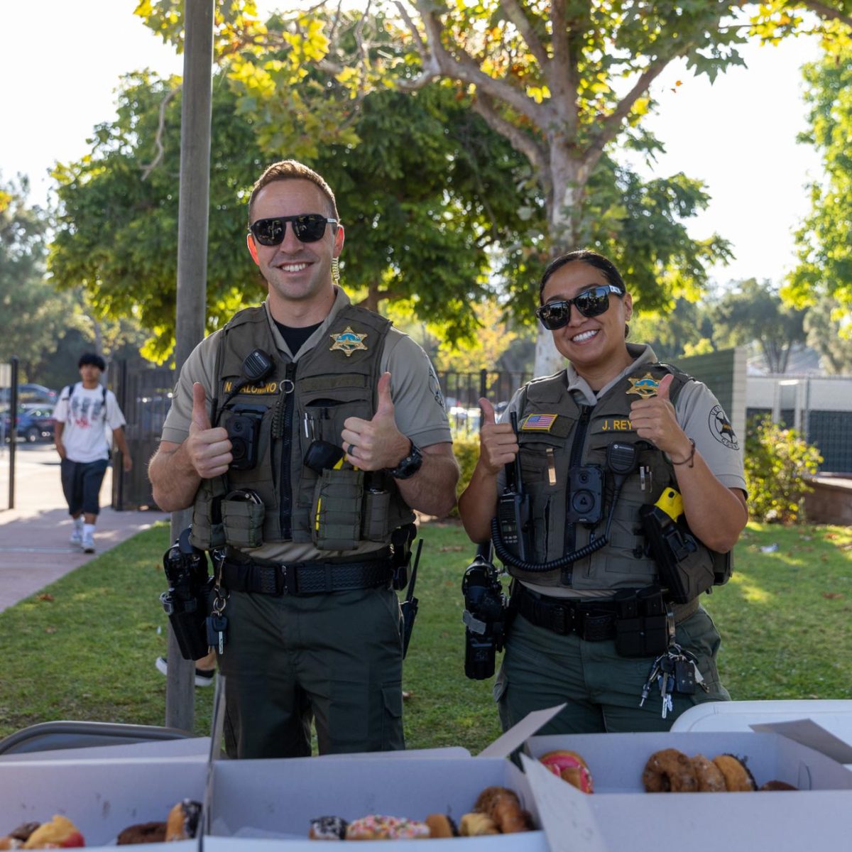 Student Resource Officers Deputy Nicholas Palomino and Newbury Park SRO Deputy Reyes made their impression on the Thousand Oaks High School Campus on Tuesday, Aug. 23, 2024, in Thousand Oaks Calif. The SROs visited TOHS as second school in their journey to visit all four comprehensive high school campuses in the Conejo Valley Unified School District. (The Lancer/Alan Ko)