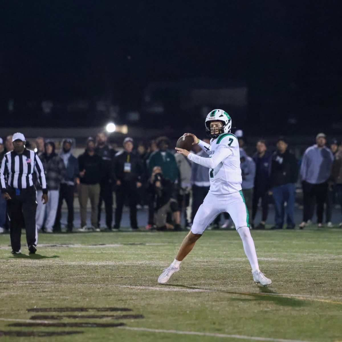 Junior quarterback Jackson Taylor on a critical 3rd-long, eyes Senior tight end Cory McEnroe in the fourth quarter of the Division 5 CIF-SS Semi Finals. The Lancers were defeated in their second matchup of the year against top seeded, Newbury Park a mere 22-19. (The Lancer/Alan Ko)